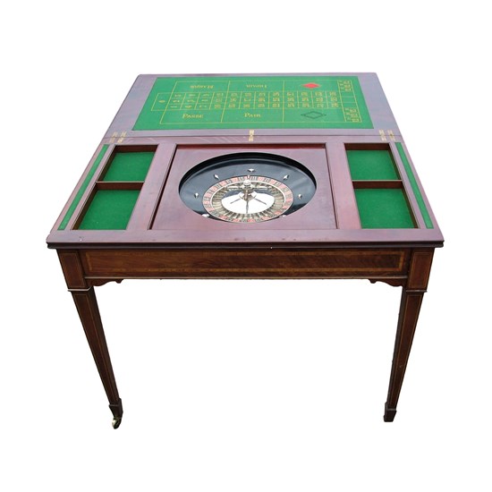 A Mahogany Games Table  attributed to Maples of London