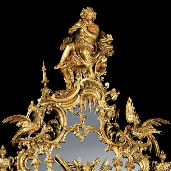 A George III Style Carved Giltwood Mirror After a design by Thomas Johnson