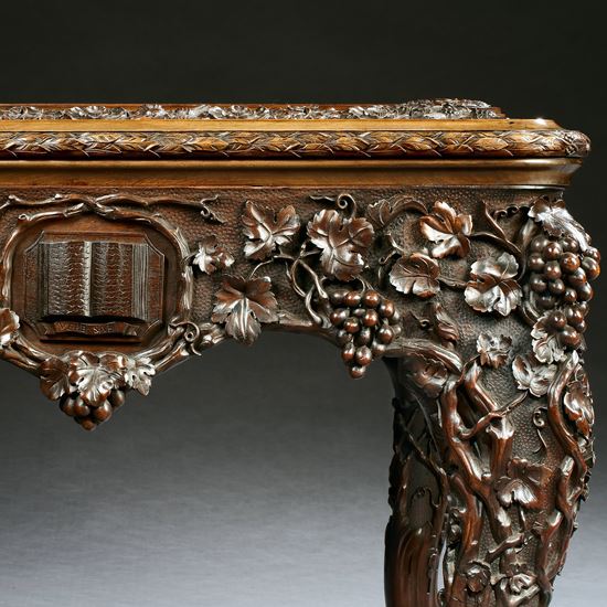 A Carved Walnut Library Table
