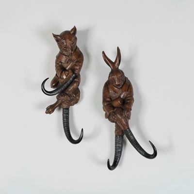 A Pair of Black Forest Whip Hooks