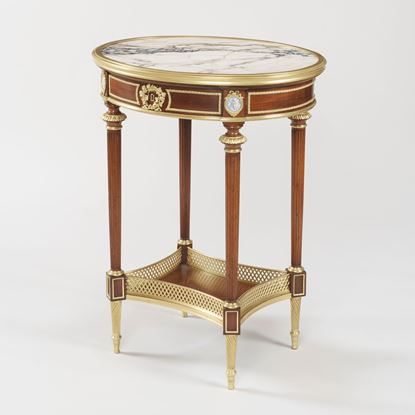A Louis XVI Style Occasional Table By Henry Dasson