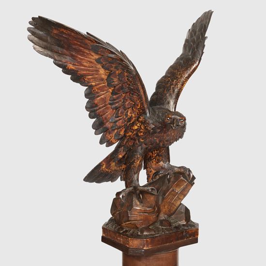 A Black Forest Sculpture of an Eagle on Stand