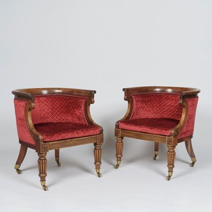 A Pair of Regency Period Bergère Armchairs