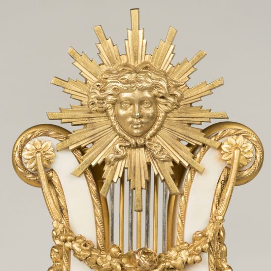 A French Clock Garniture in the Louis XVI Manner