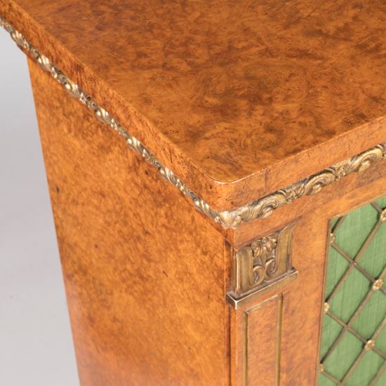 A Regency Period Parcel Gilt and Amboyna  Breakfront Side Cabinet