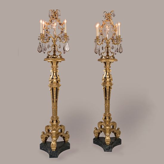 A Pair of Giltwood Carved Torchères