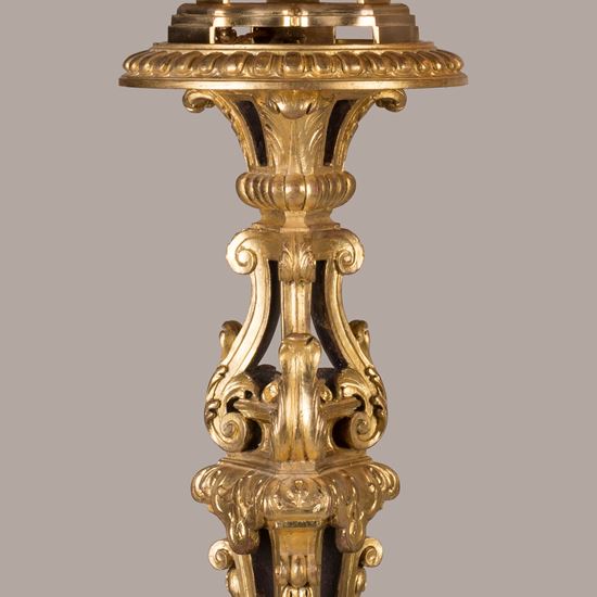 A Pair of Giltwood Carved Torchères