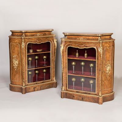 A Pair of Burr Walnut Cabinets By Gillows