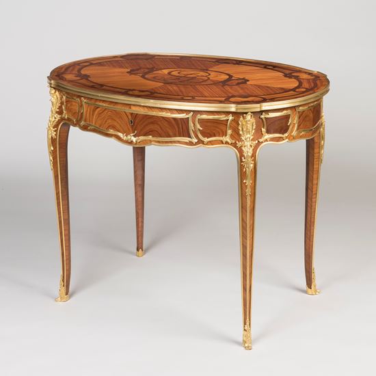 An Elegant Tulipwood Table In the Louis XVI Style