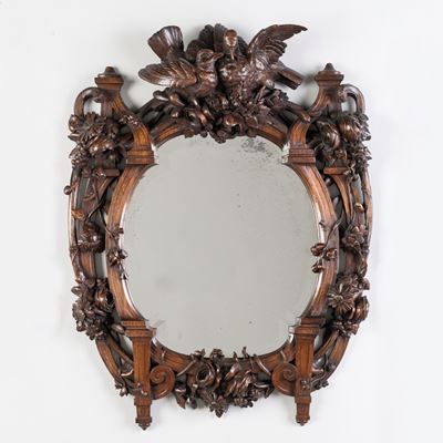 A Black Forest Carved Mirror
