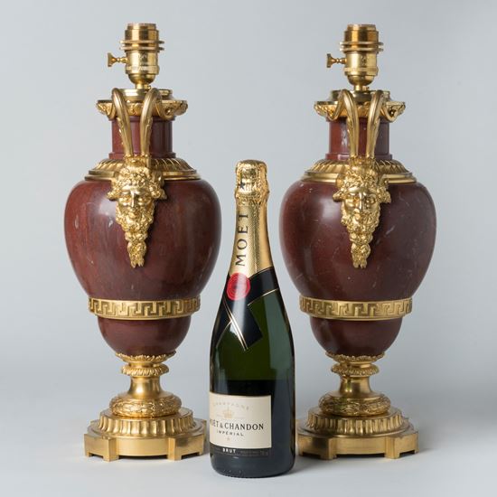 A Pair of French Ormolu-Mounted Red Marble Lamps