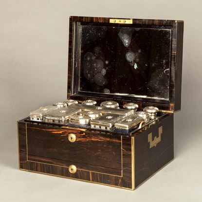 A Victorian coromandel and brass bound dressing case by Asprey 