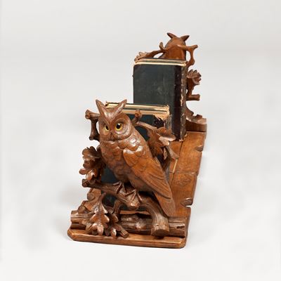 A Whimsical Black Forest Book Rack, probably by Arnold Ruef