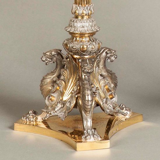 A Pair of Plated and Parcel Gilt Candelabra by Elkington and Co