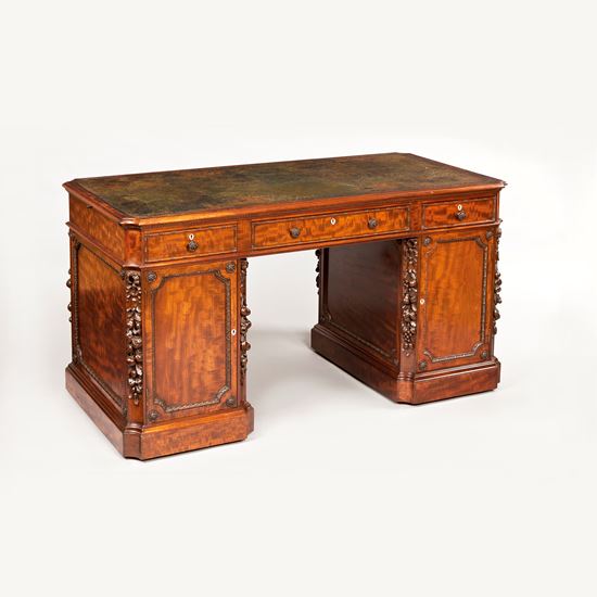 An Antique Mahogany Pedestal Desk by Hamptons
