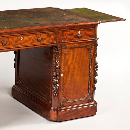 An Antique Mahogany Pedestal Desk by Hamptons