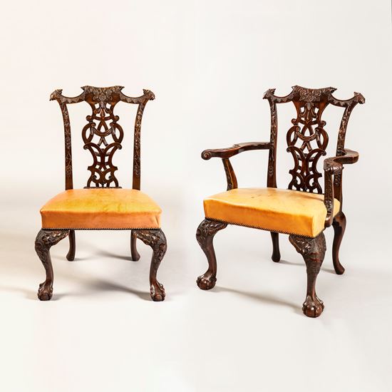 An Excellent Long Set of Carved Mahogany Dining Chairs
