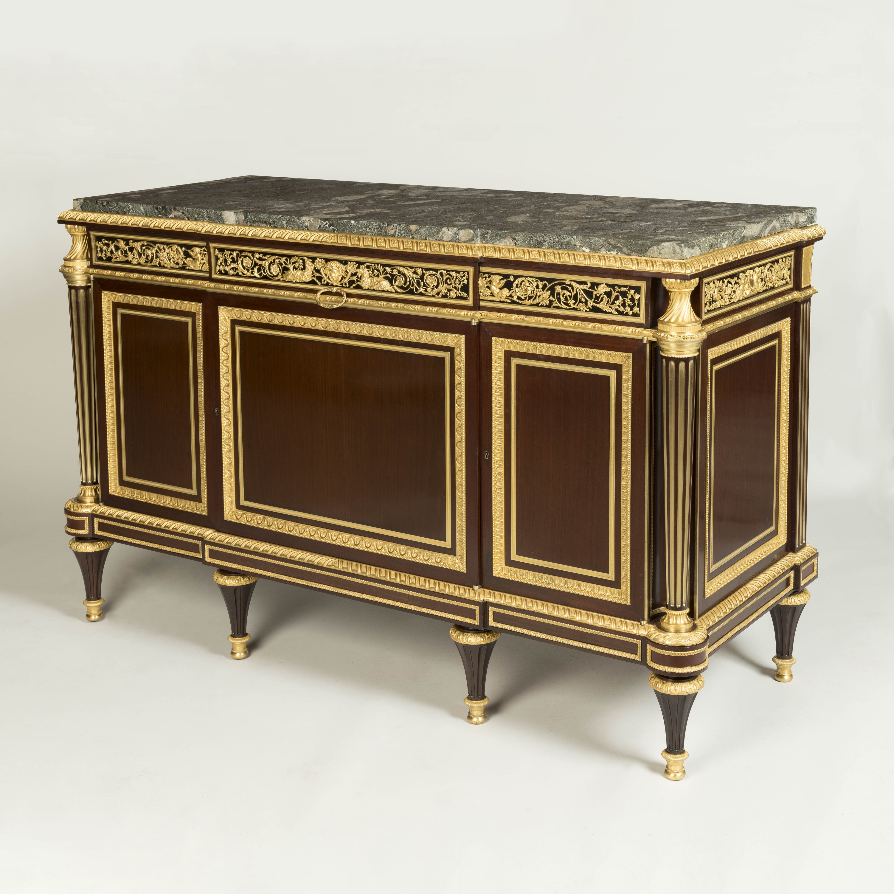 An Important Louis XVI Style Commode by Henry Dasson