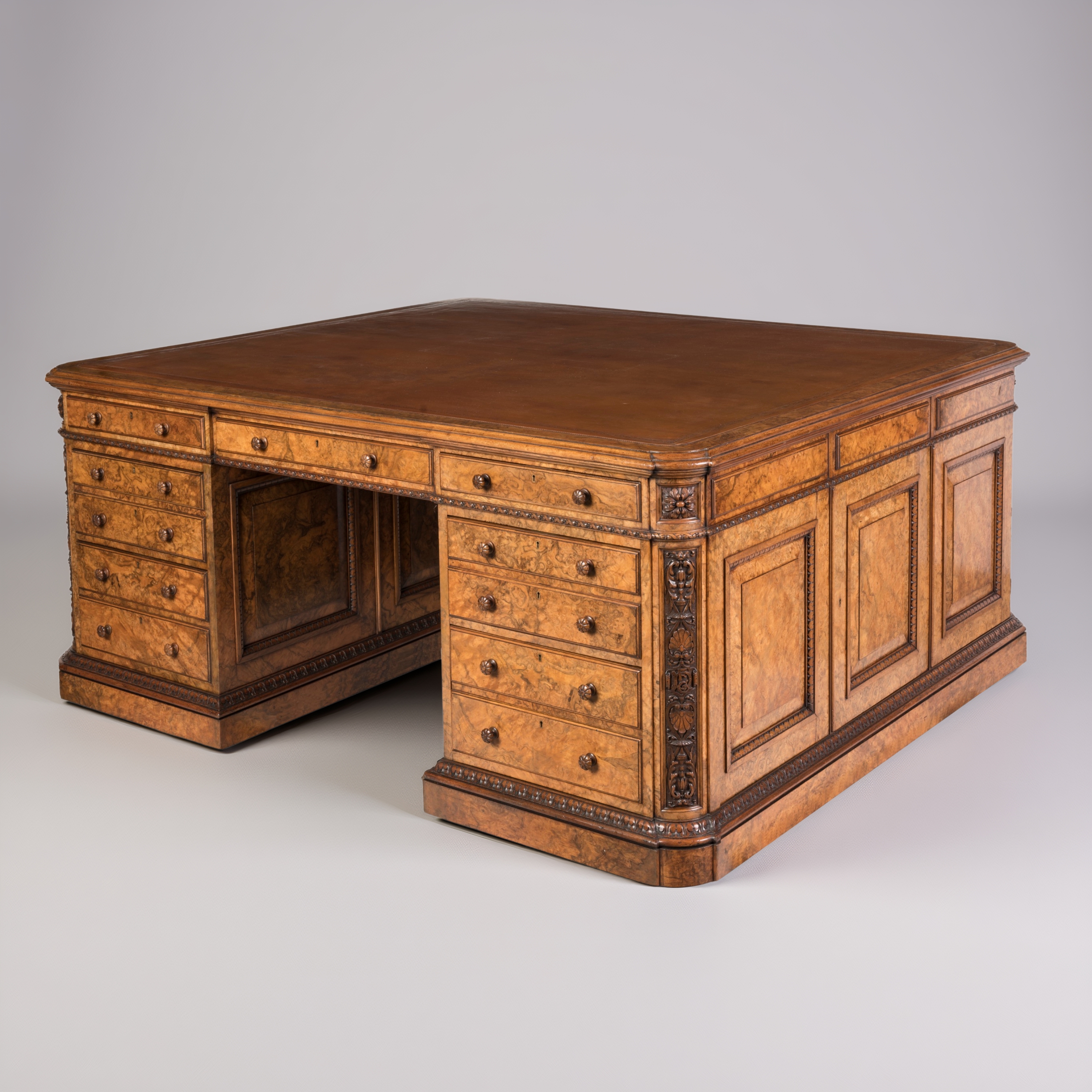 A Substantial Walnut Partners' Desk By Holland & Sons, circa 1875.