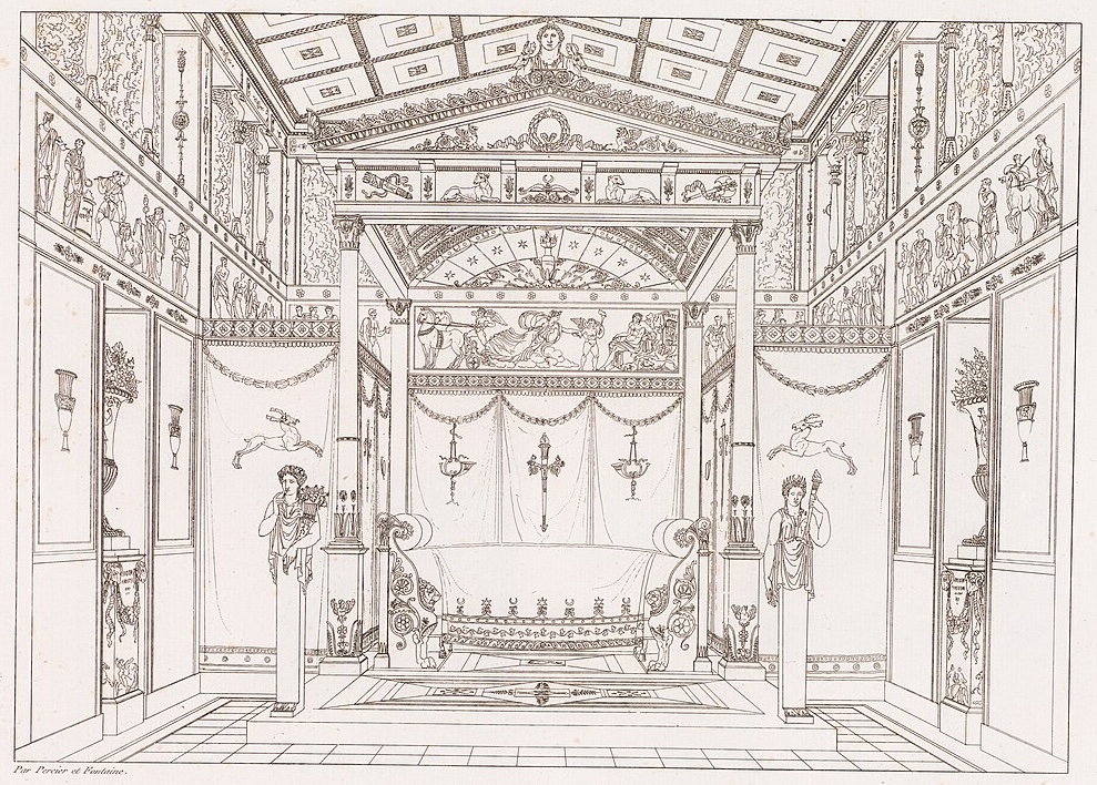A symmetrical black-and-white architectural etching of a grand Neoclassical bedroom from the 1812 "Recueil de Décorations Intérieures." A low, ornate bed is centered on a raised dais, framed by columns and a tall canopy with draped fabric. The walls and ceiling are heavily decorated with Greco-Roman motifs, including friezes of figures, sphinxes, laurel wreaths, and floral garlands.