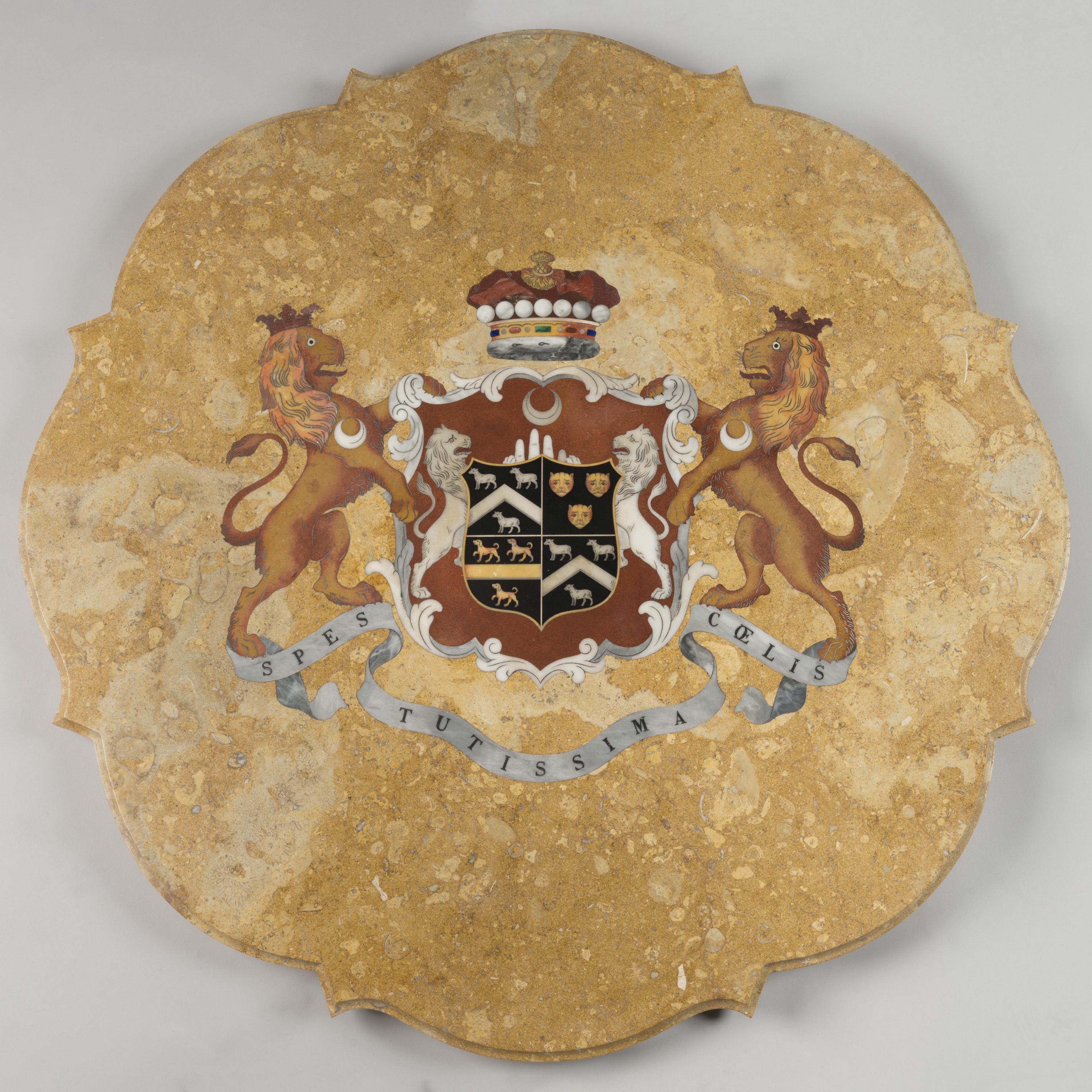 Scalloped sienna marble tabletop by Darmanin featuring a central armorial crest in Pietra Dura. Flanked by lion supporters, the coat of arms includes a coronet and a "Spes Tutissima Coelis" banner.