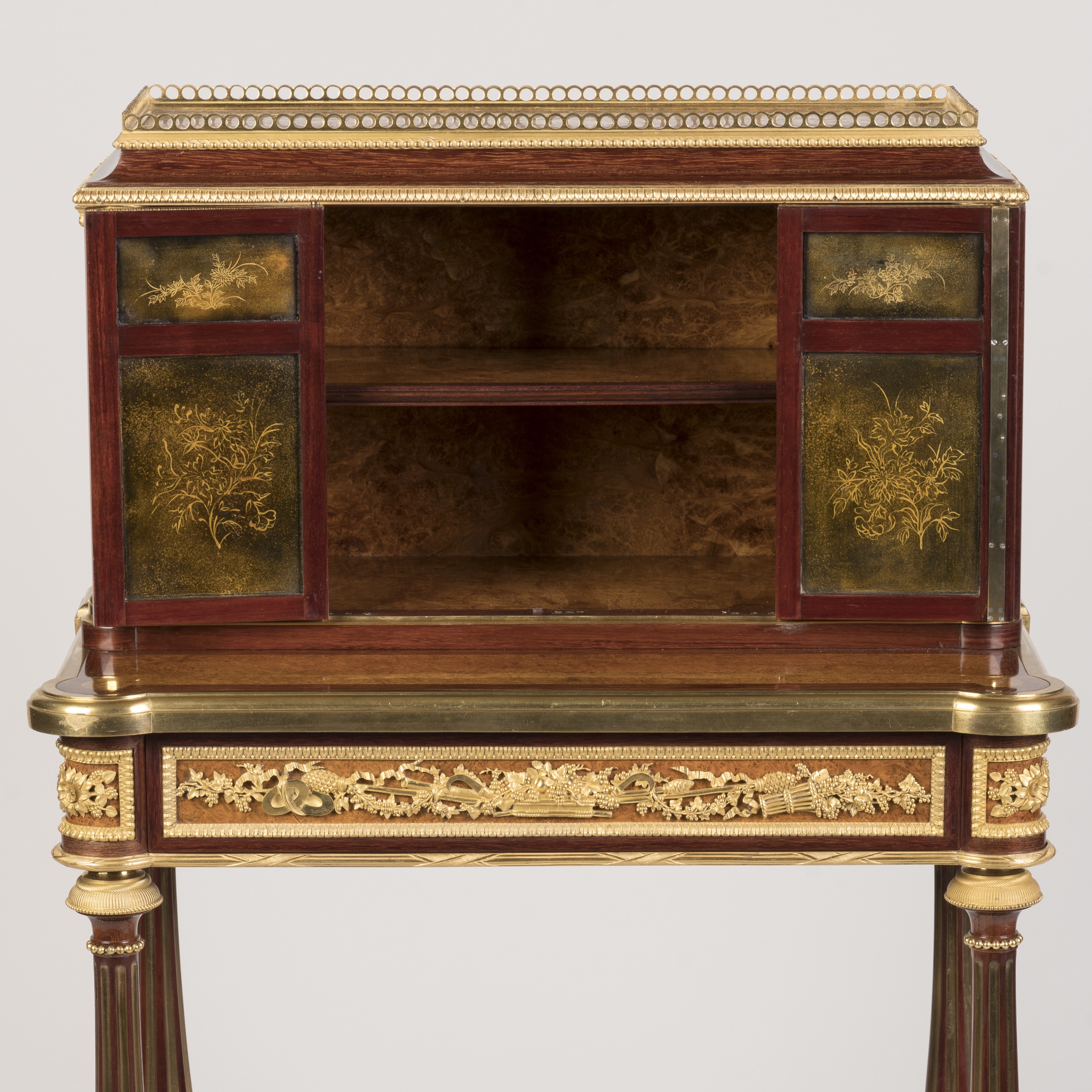 An Ormolu-Mounted Amboyna and Lacquer Bonheur-du-Jour by Henry Dasson