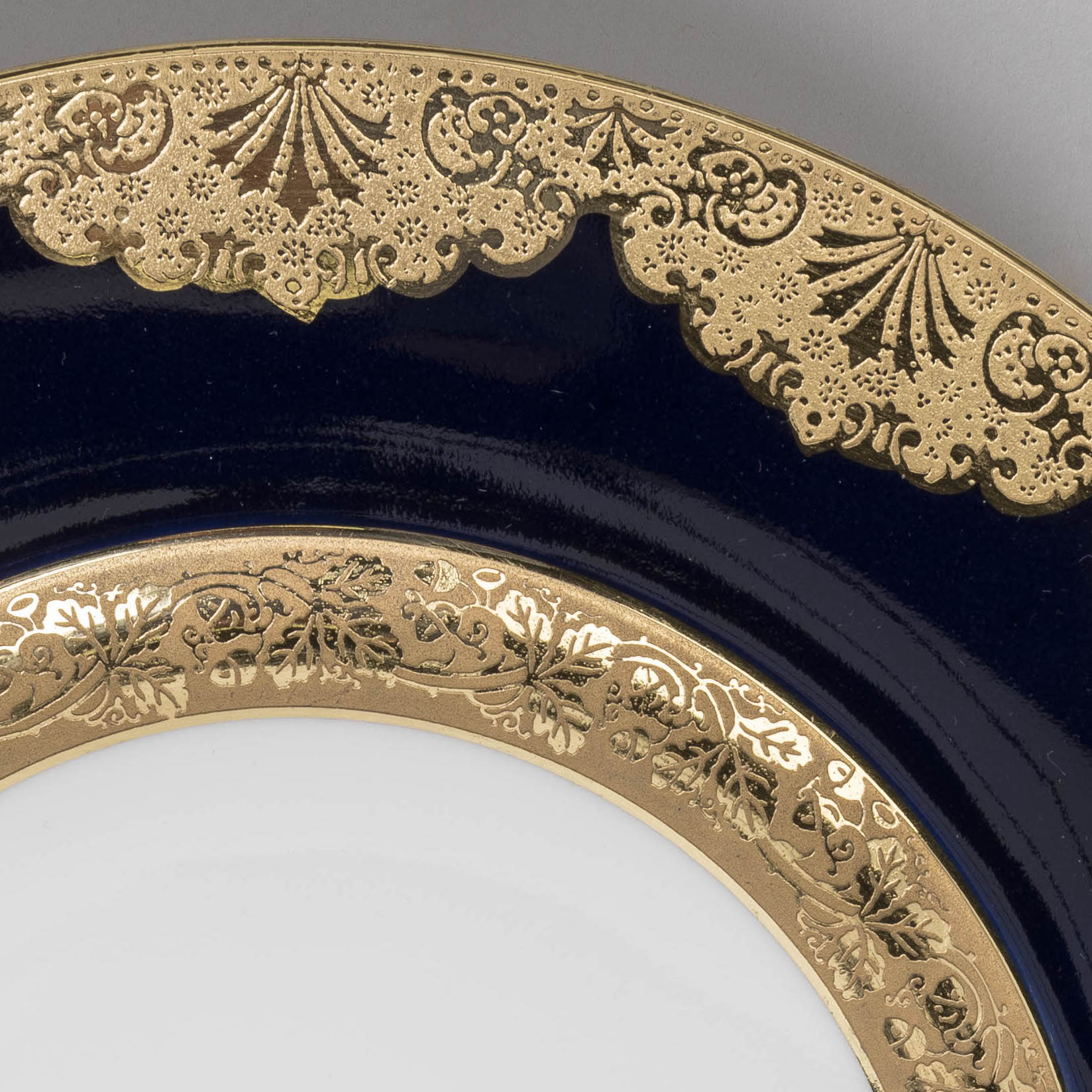A Set of 12 Limoges Porcelain Blue & Gilt Porcelain Dinner Plates By Alfred Lanternier