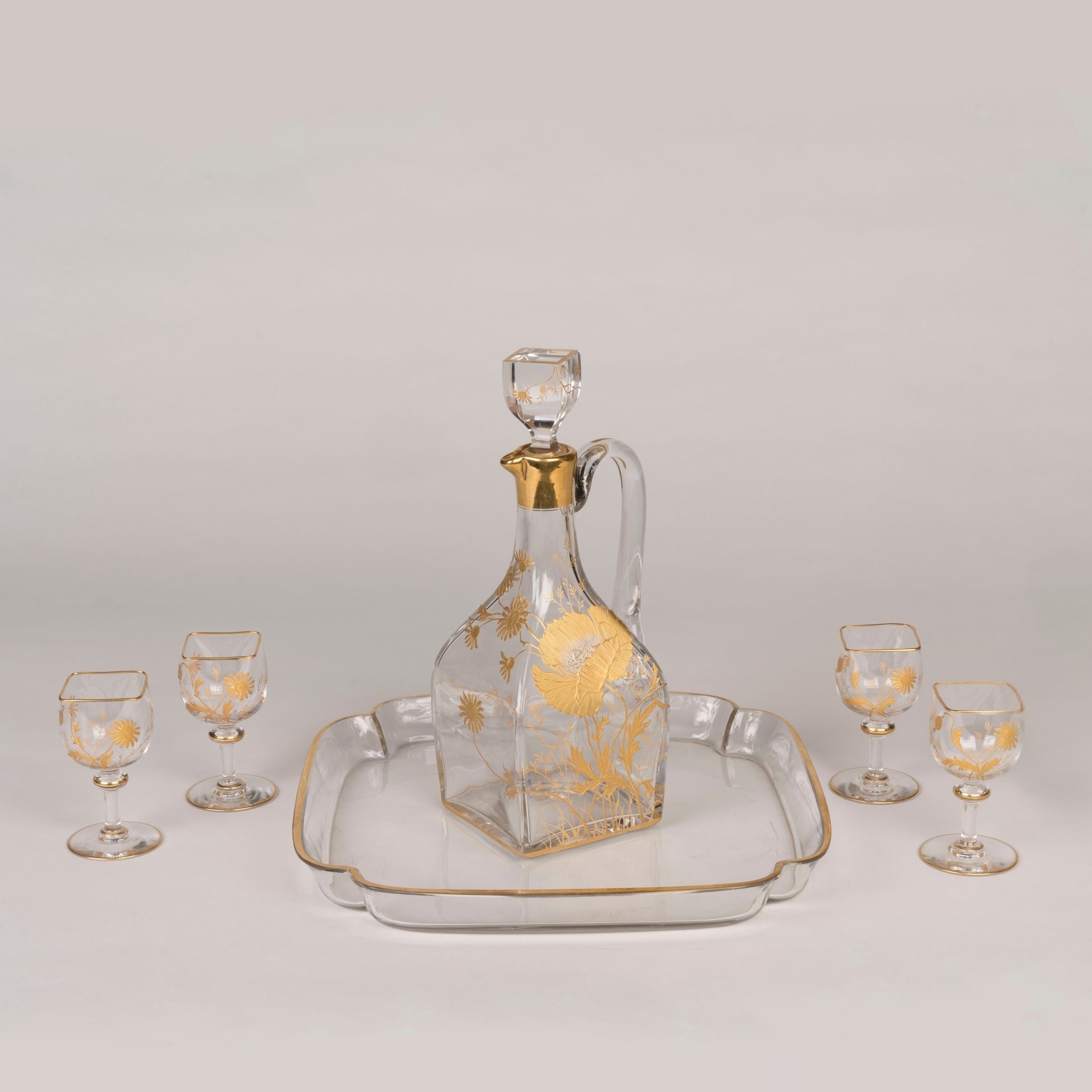 An Art Nouveau Parcel Gilt Crystal Drinks Set By Baccarat