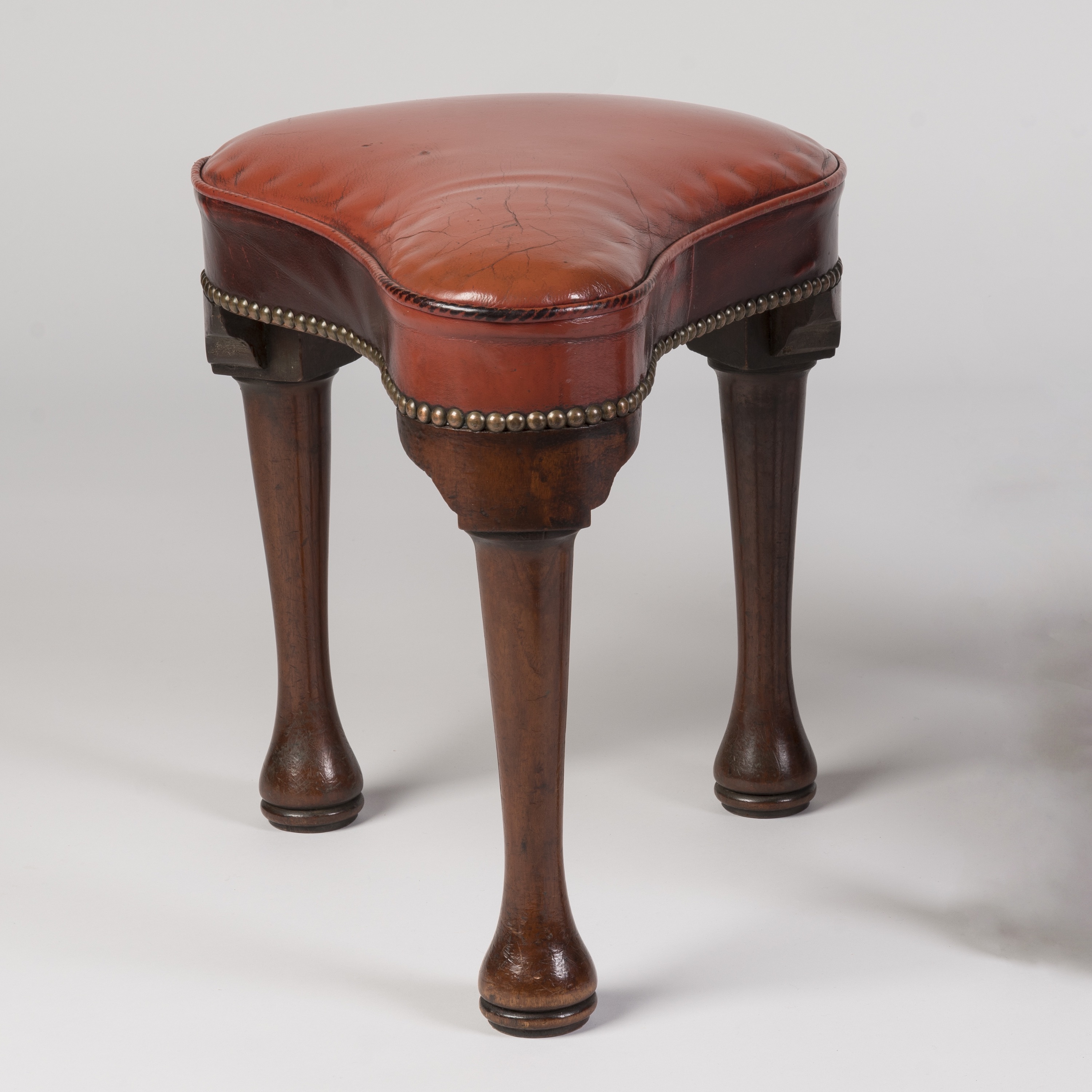 An Unusual George II Period Pair of Saddle-Shaped Stools