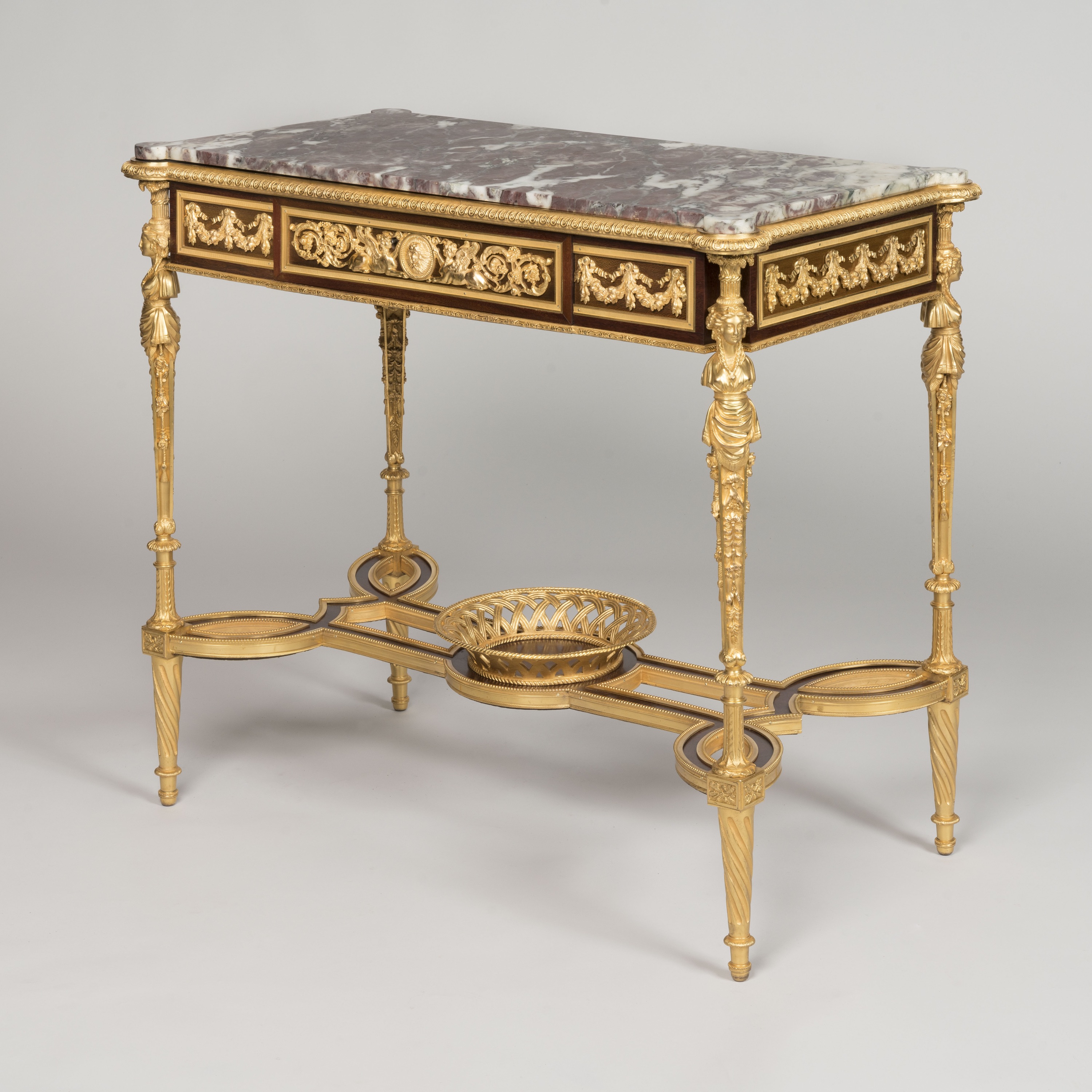 A Louis XVI Style Ormolu-Mounted Table