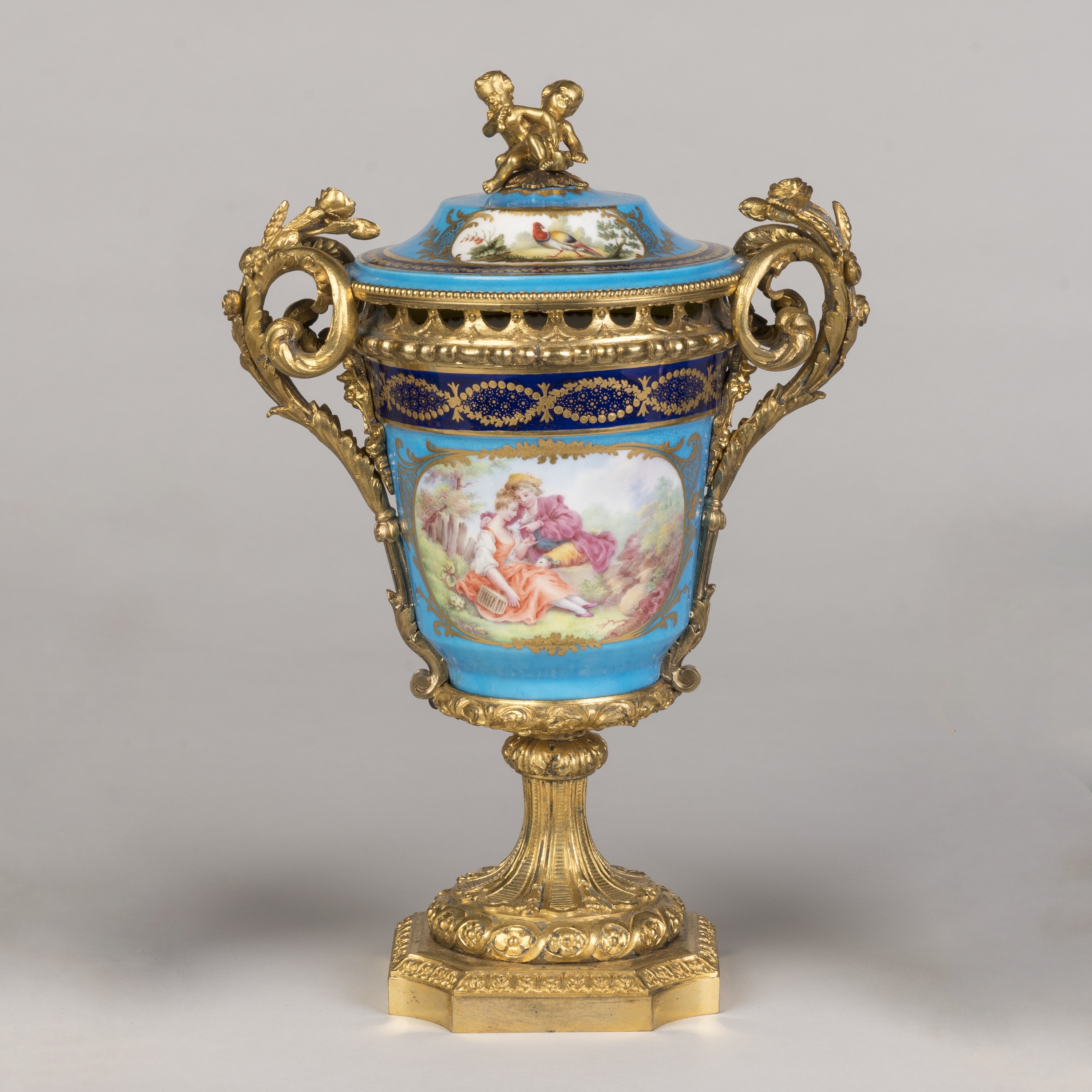 A French Matched Three-Piece Porcelain Garniture