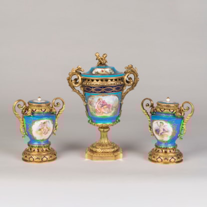 A French Matched Three-Piece Porcelain Garniture