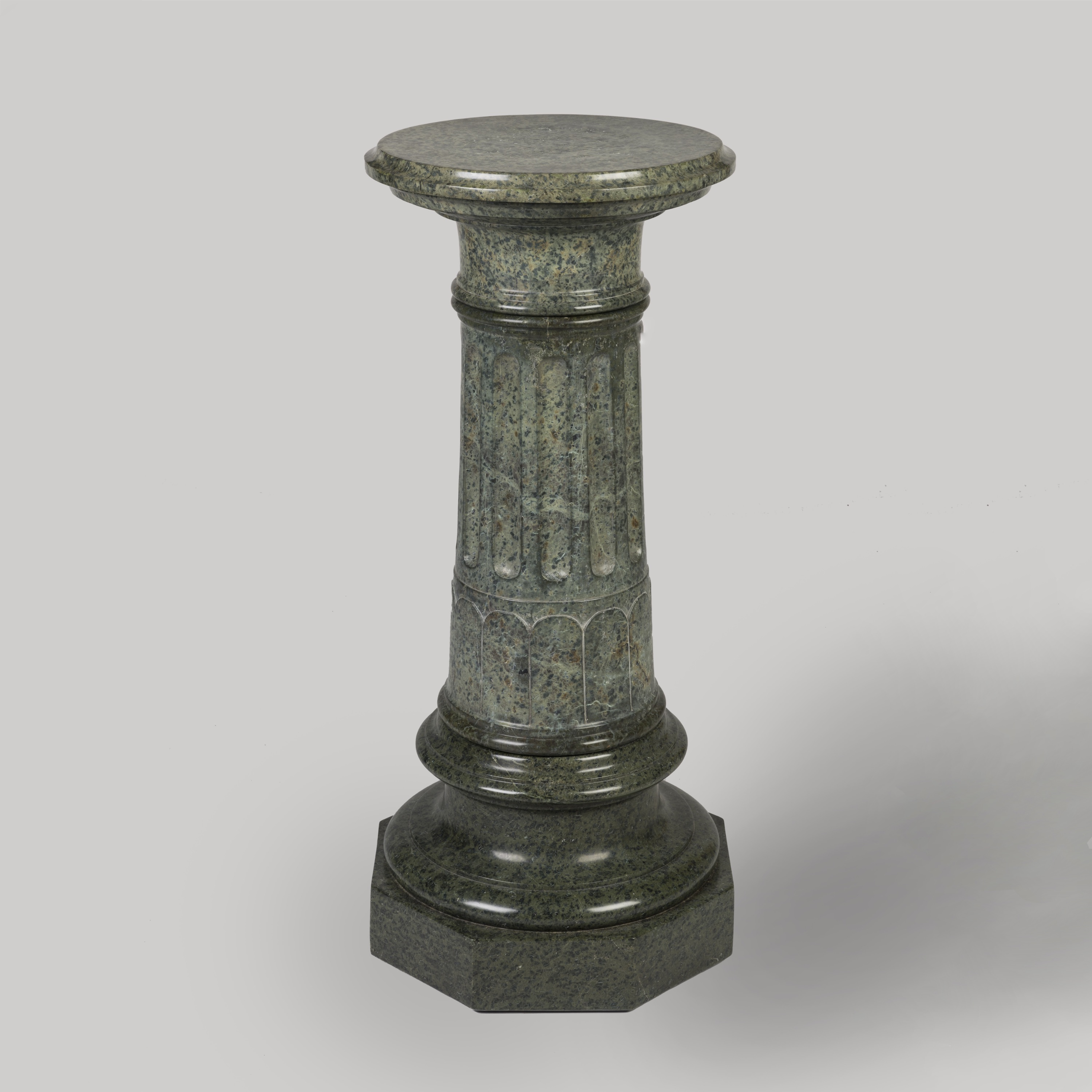 A Green Serpentine Marble Pedestal