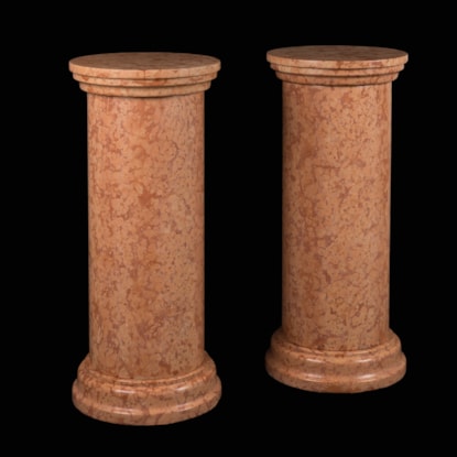 A Pair of Breccia Marble Pedestals