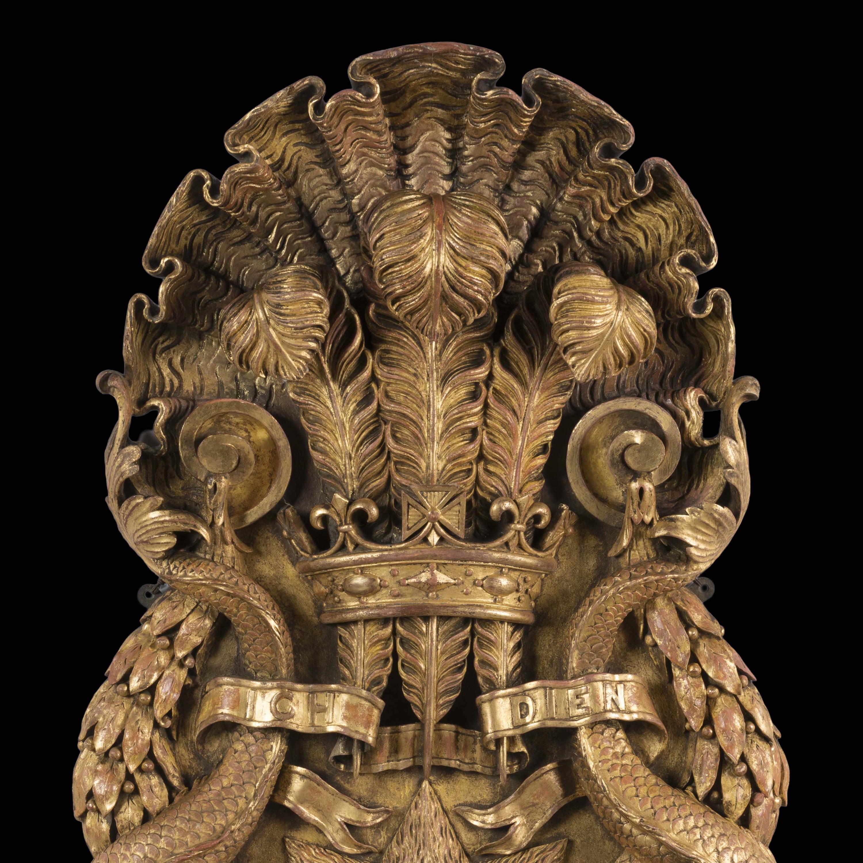 A Pair of Carved Giltwood Plaques After the design by William Kent