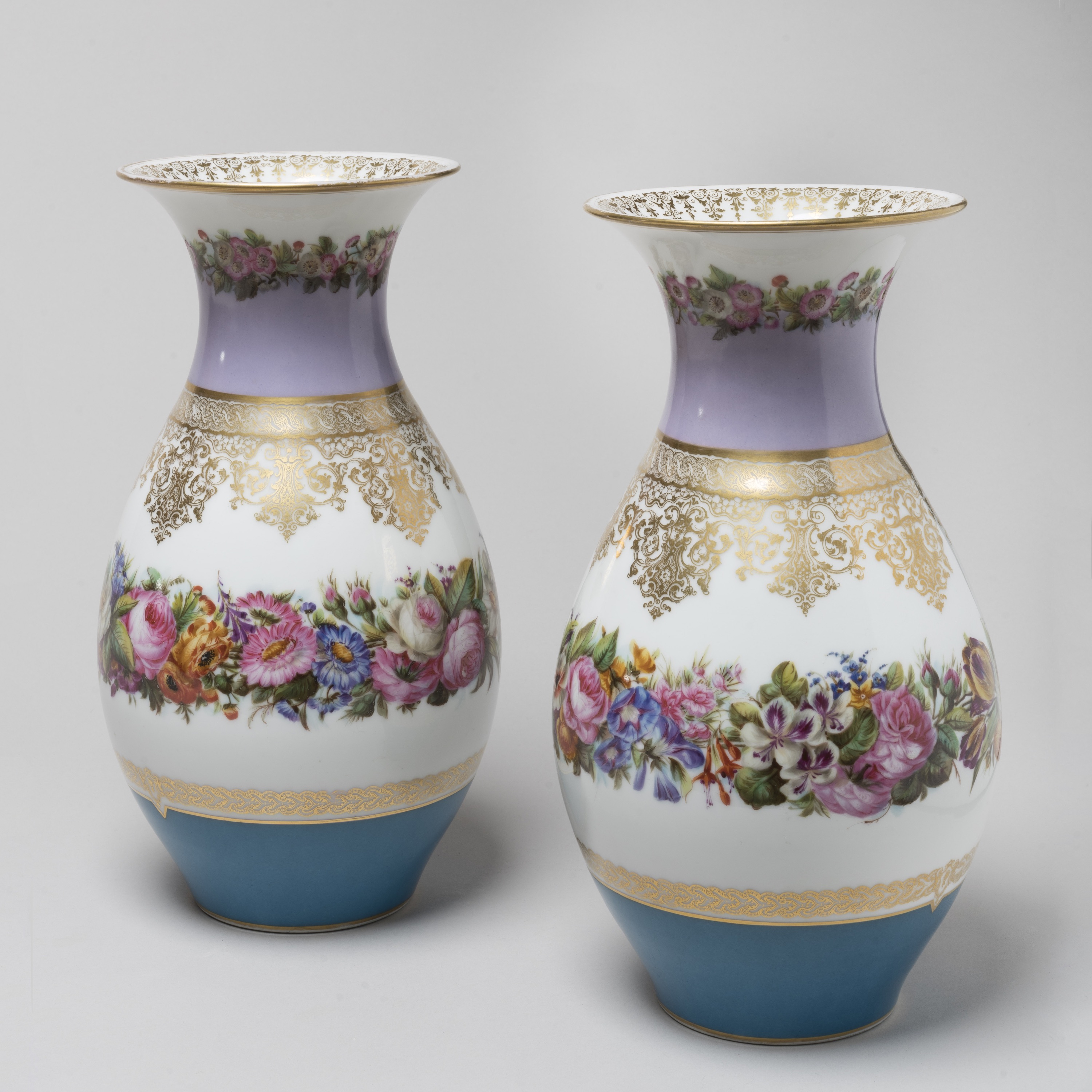 A Pair of Parcel Gilt Porcelain Vases