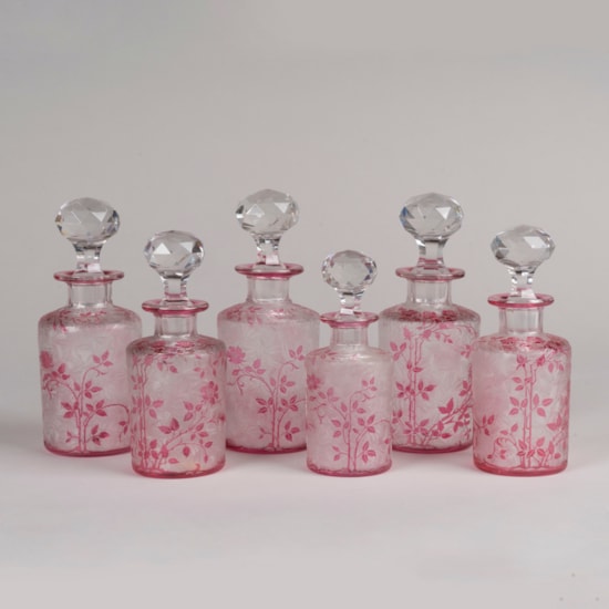 A Set of Six 'Wild Rose' Perfume Bottles