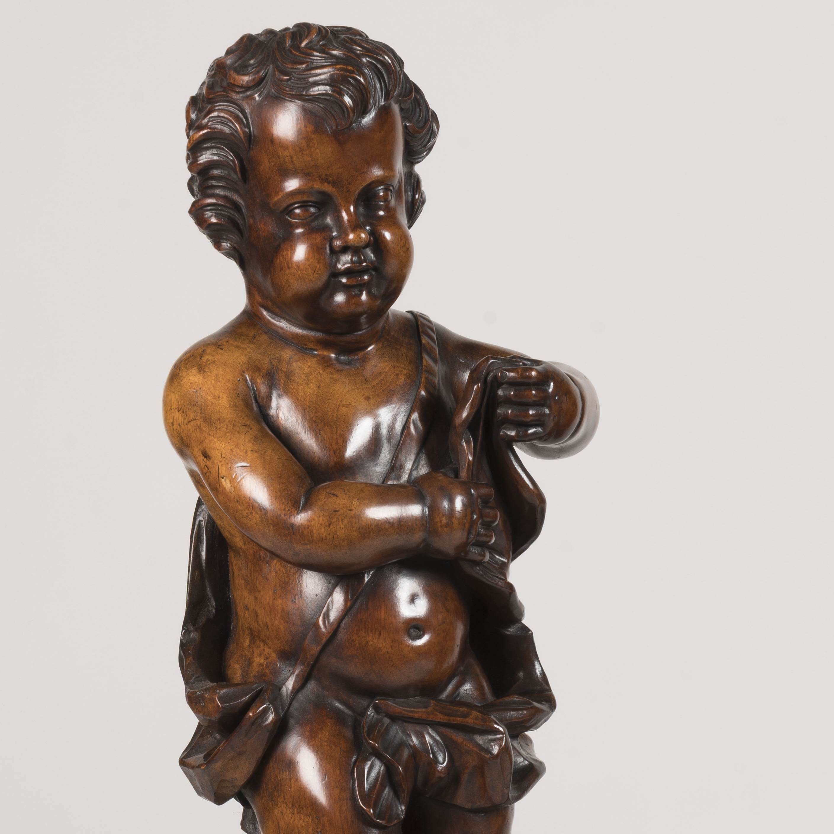 A Pair of Italian Carved Putti