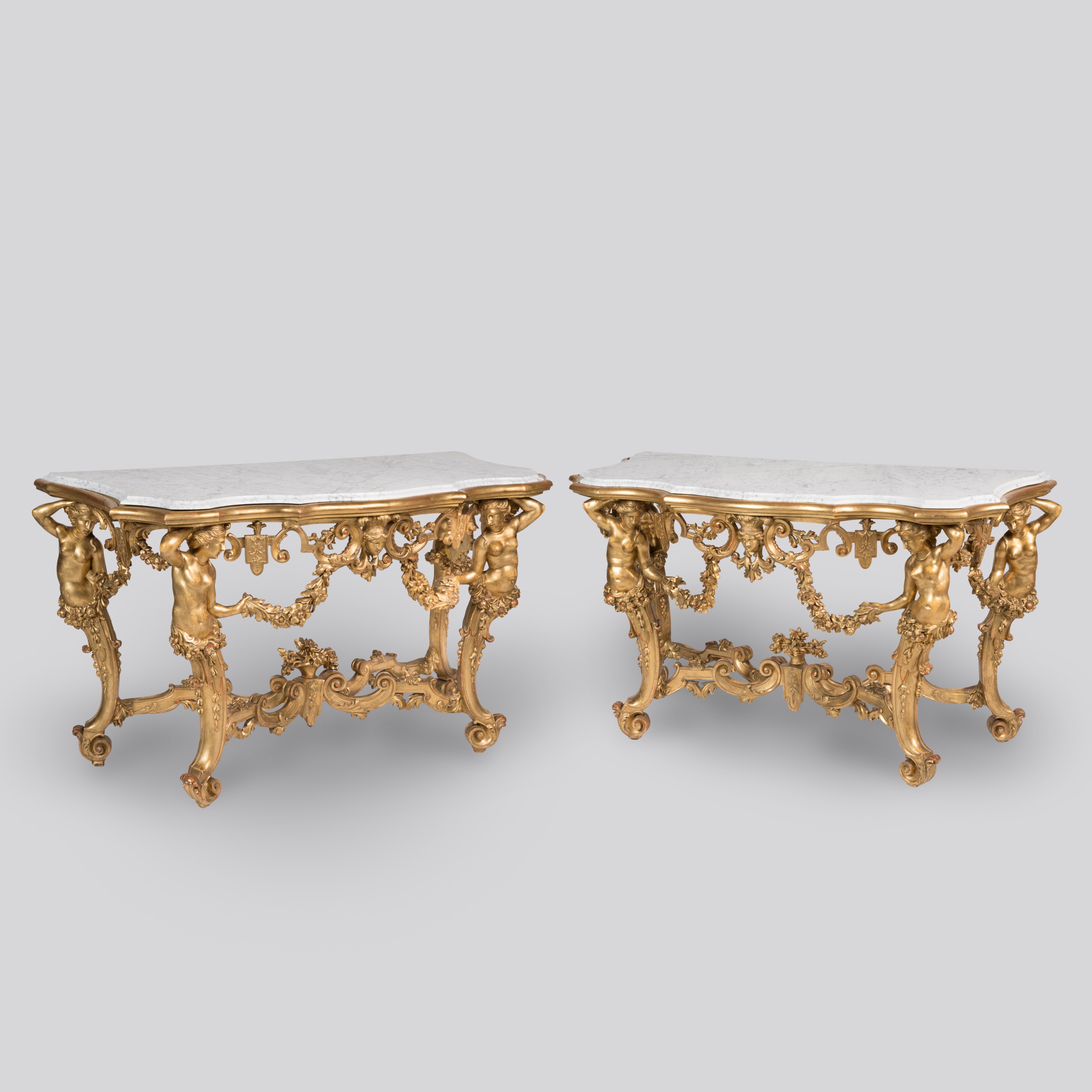 A Pair of Italian Carved Giltwood Console Tables
