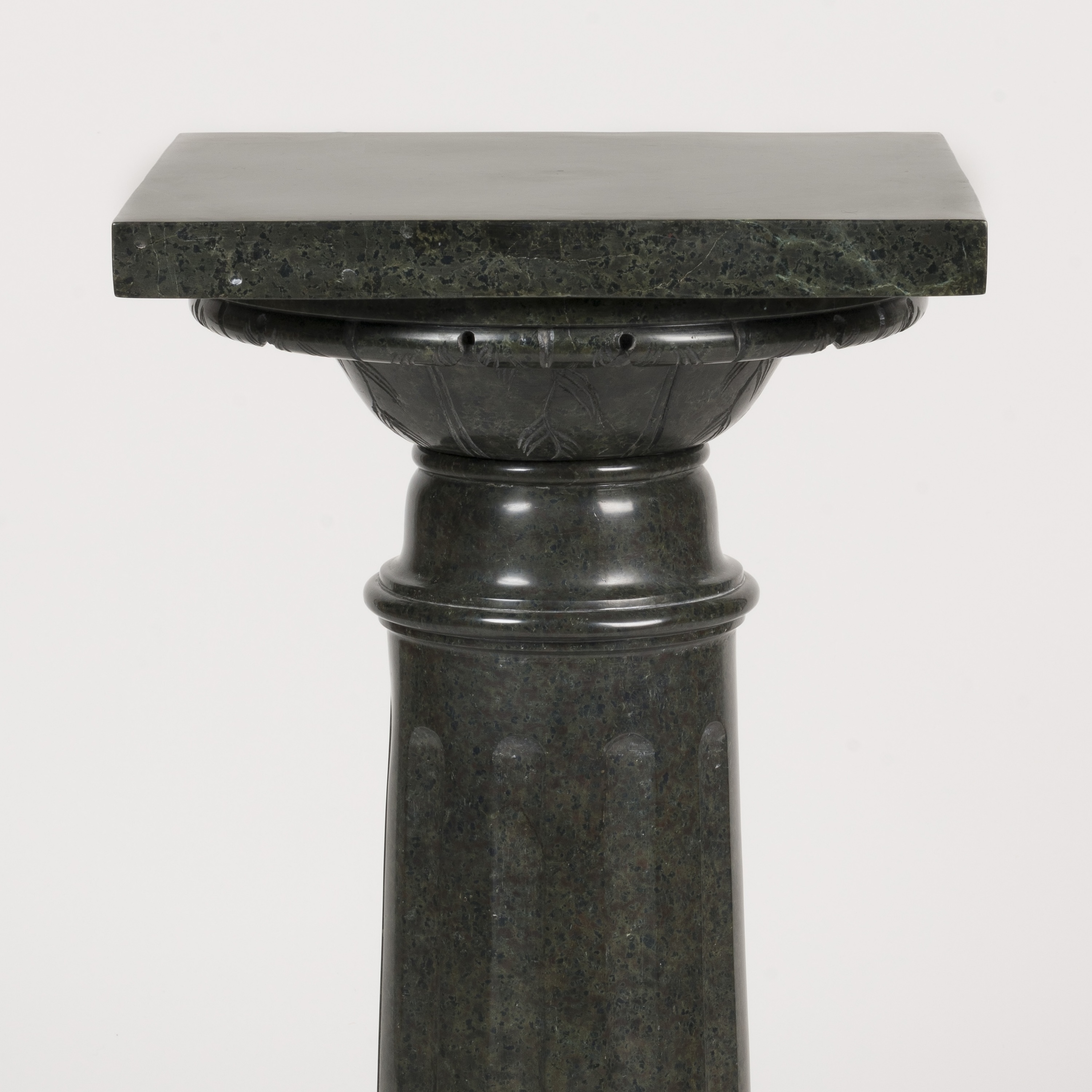A Green Serpentine Marble Pedestal