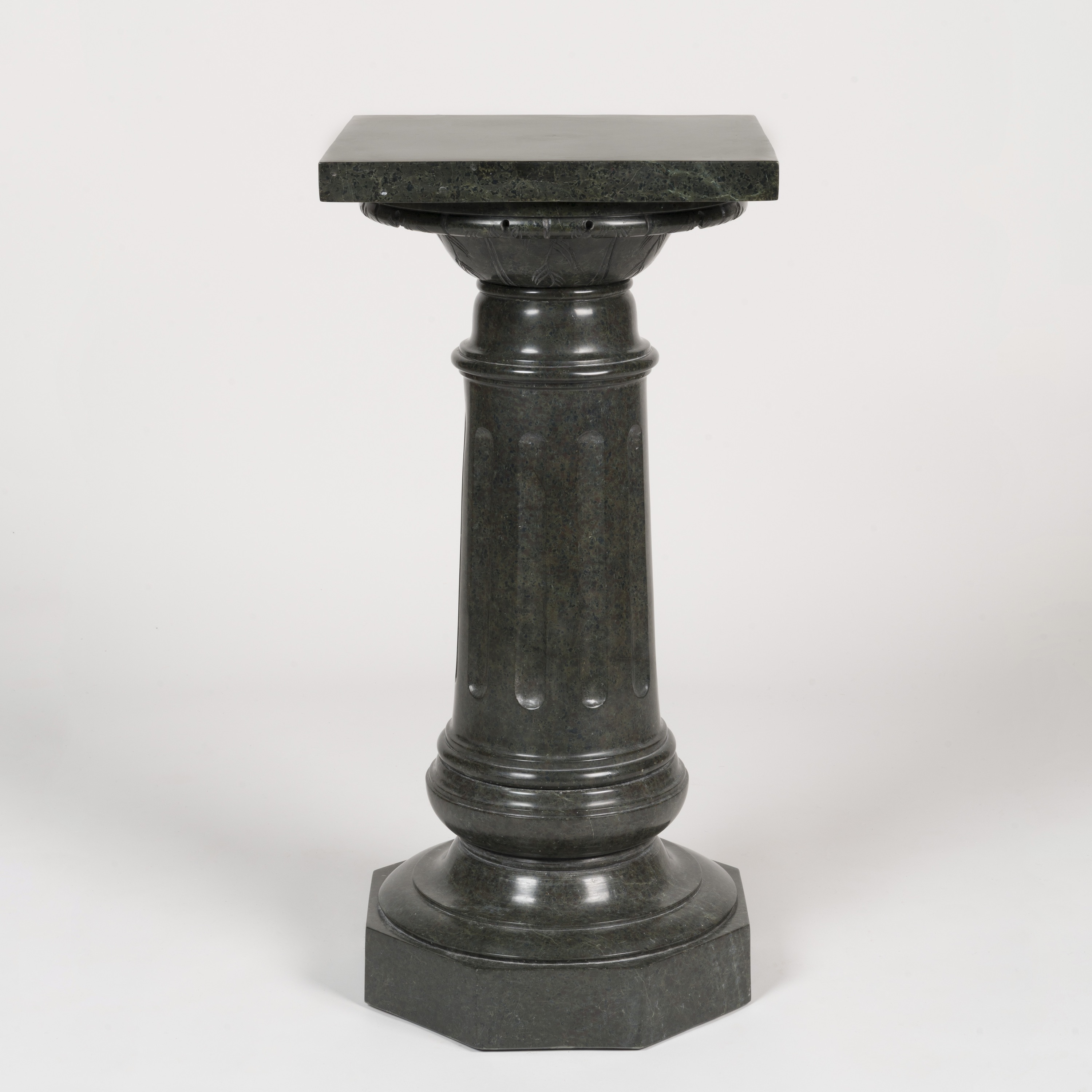A Green Serpentine Marble Pedestal