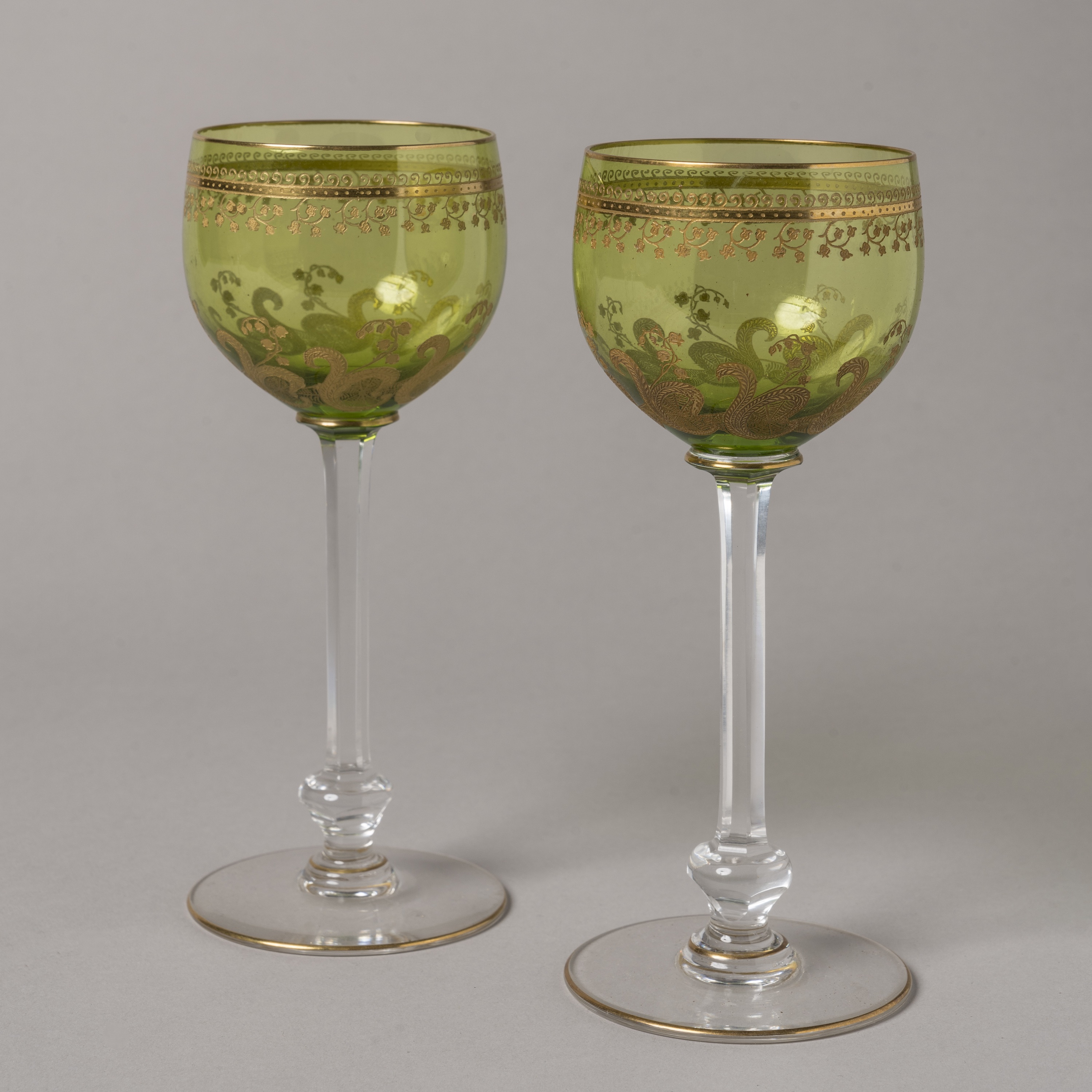 A Set of Twelve Green & Gilt Overlay Crystal Glasses