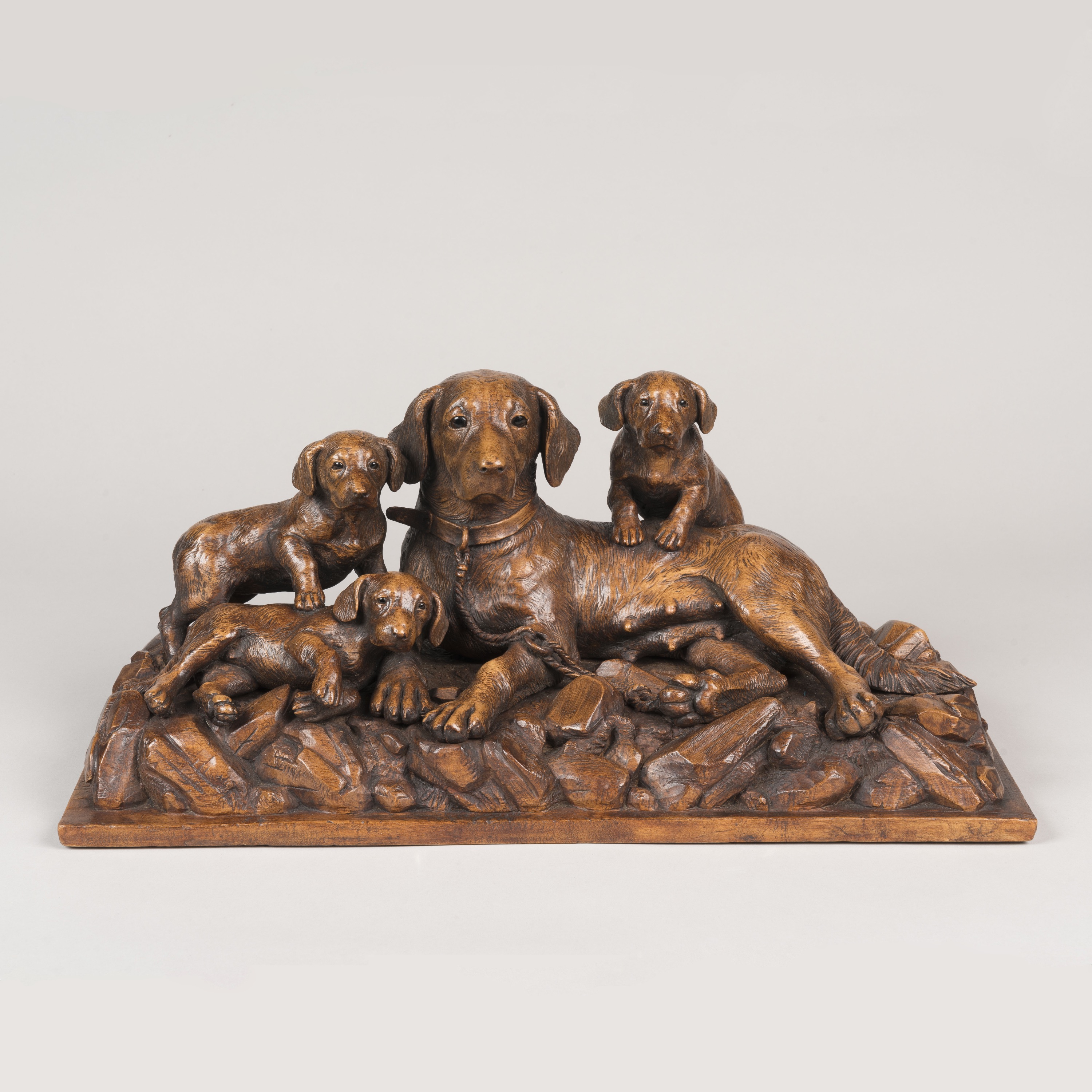 A 'Black Forest' Carved Dog Group