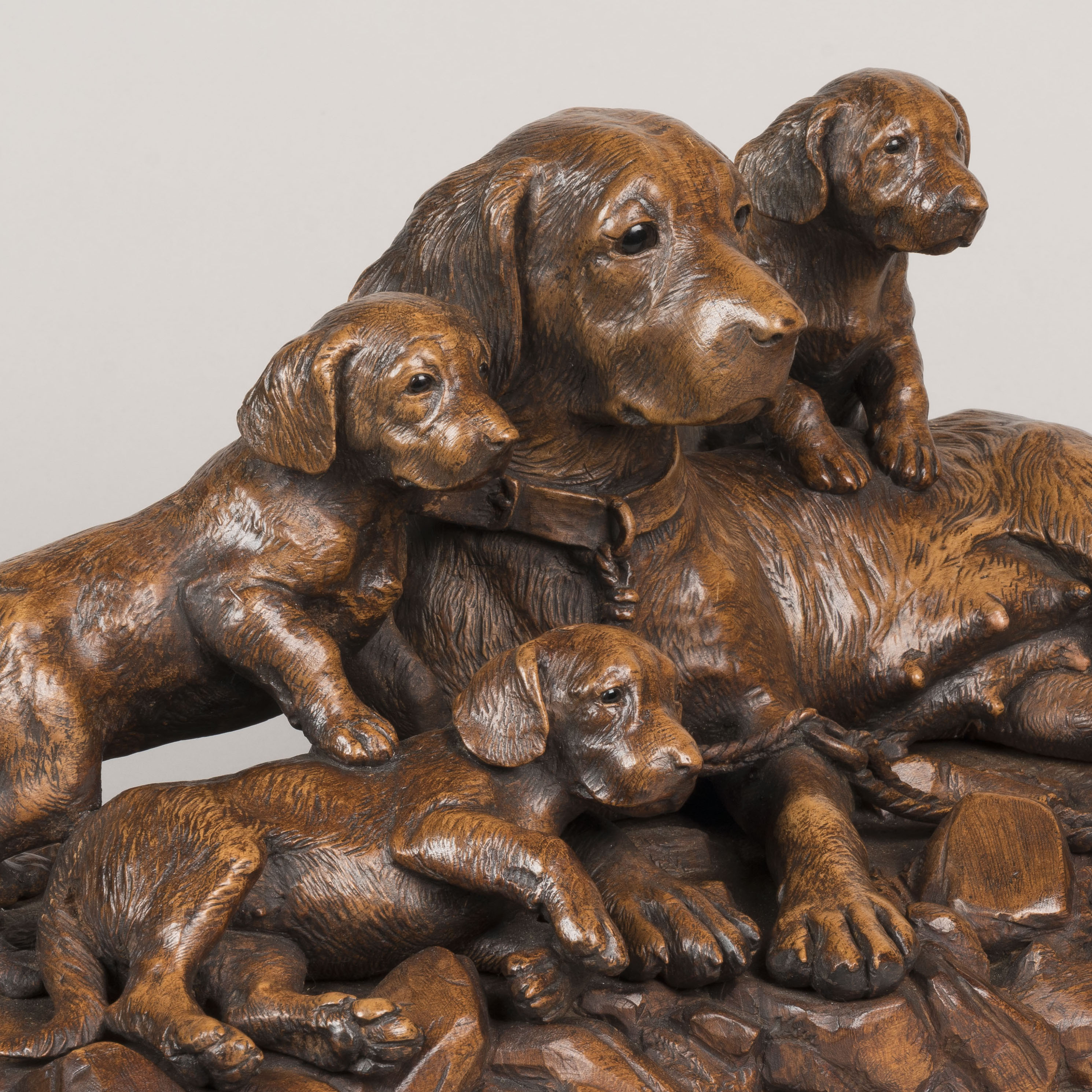 A 'Black Forest' Carved Dog Group