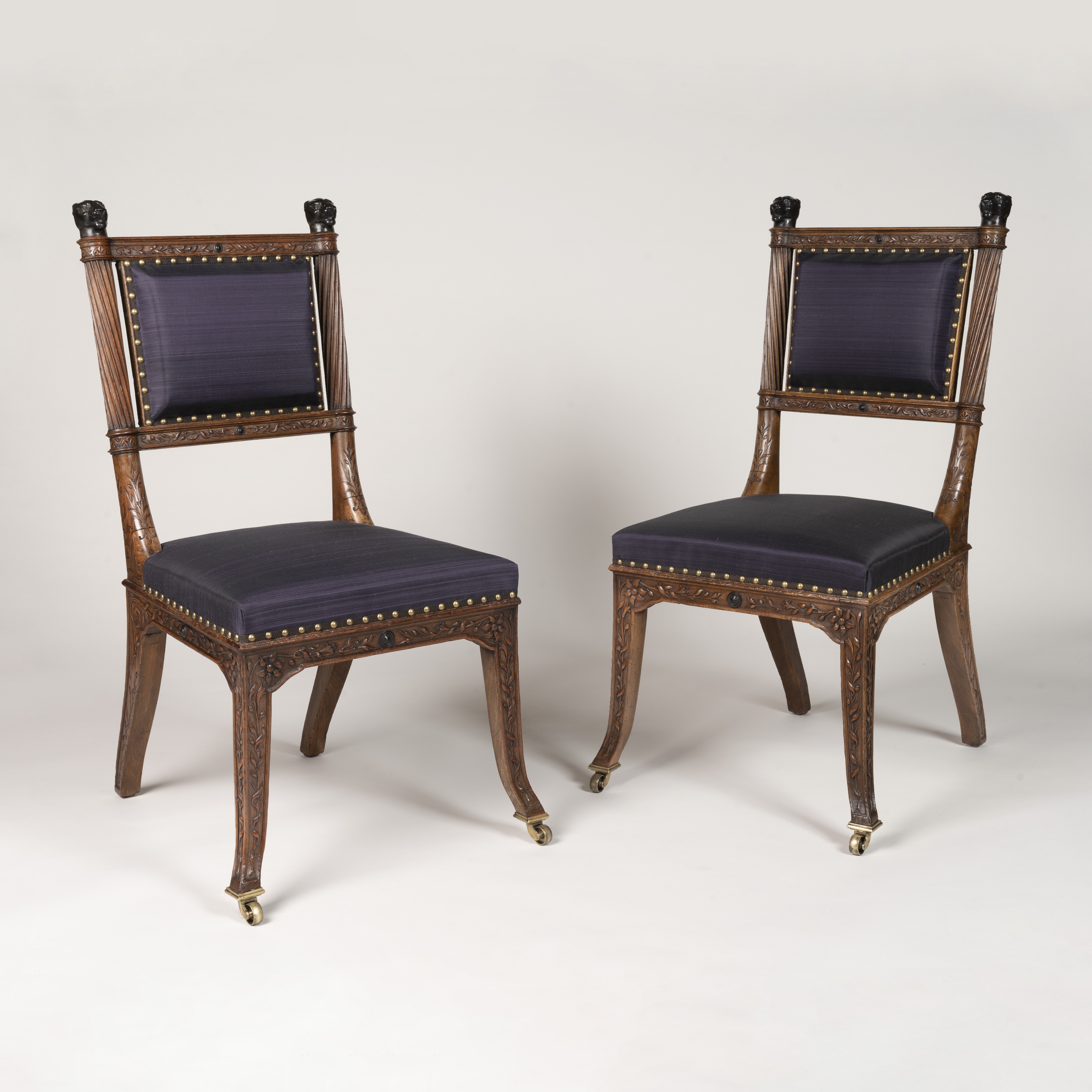 A Striking Pair of Walnut Chairs by Gillows