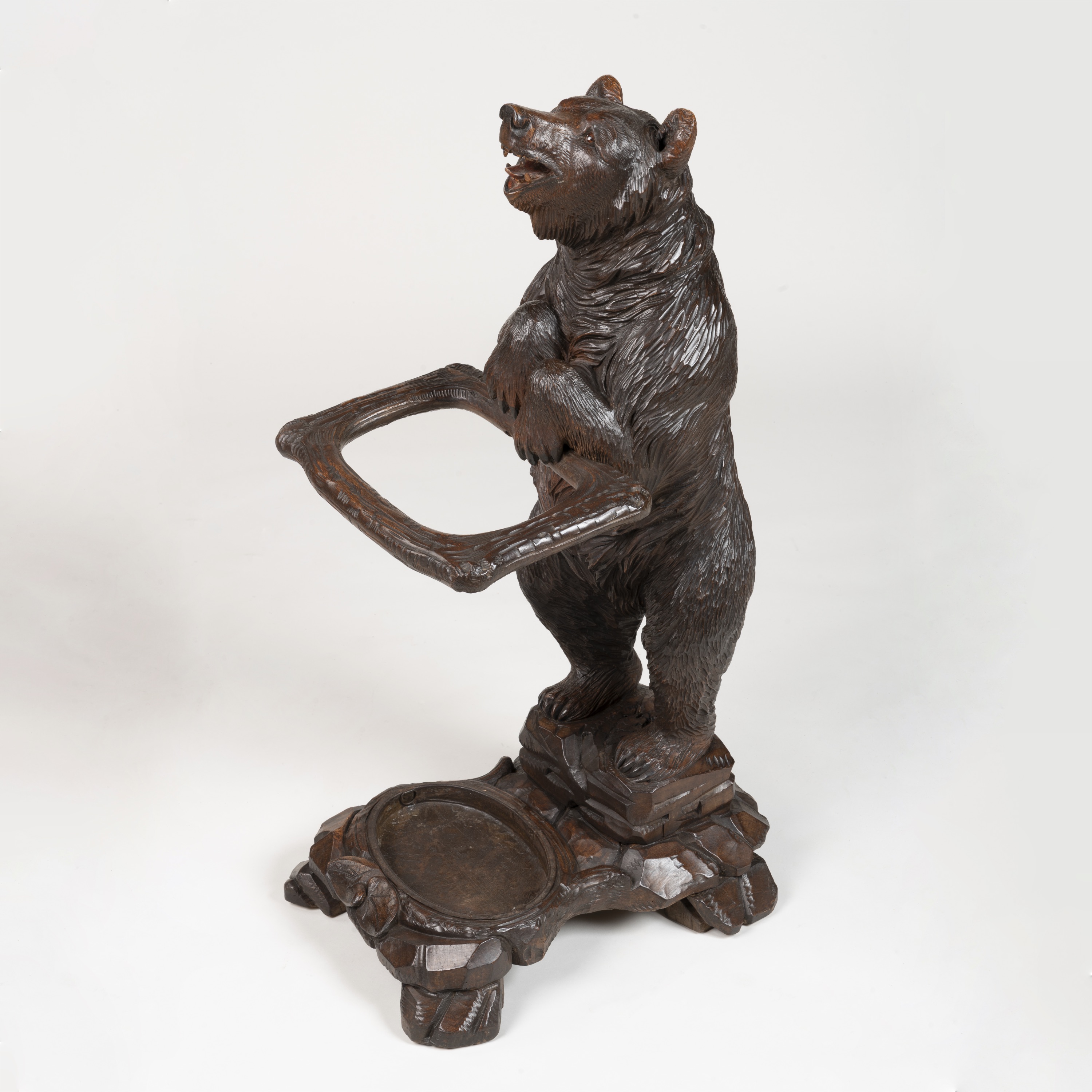 A 'Black Forest' Carved Bear Stand