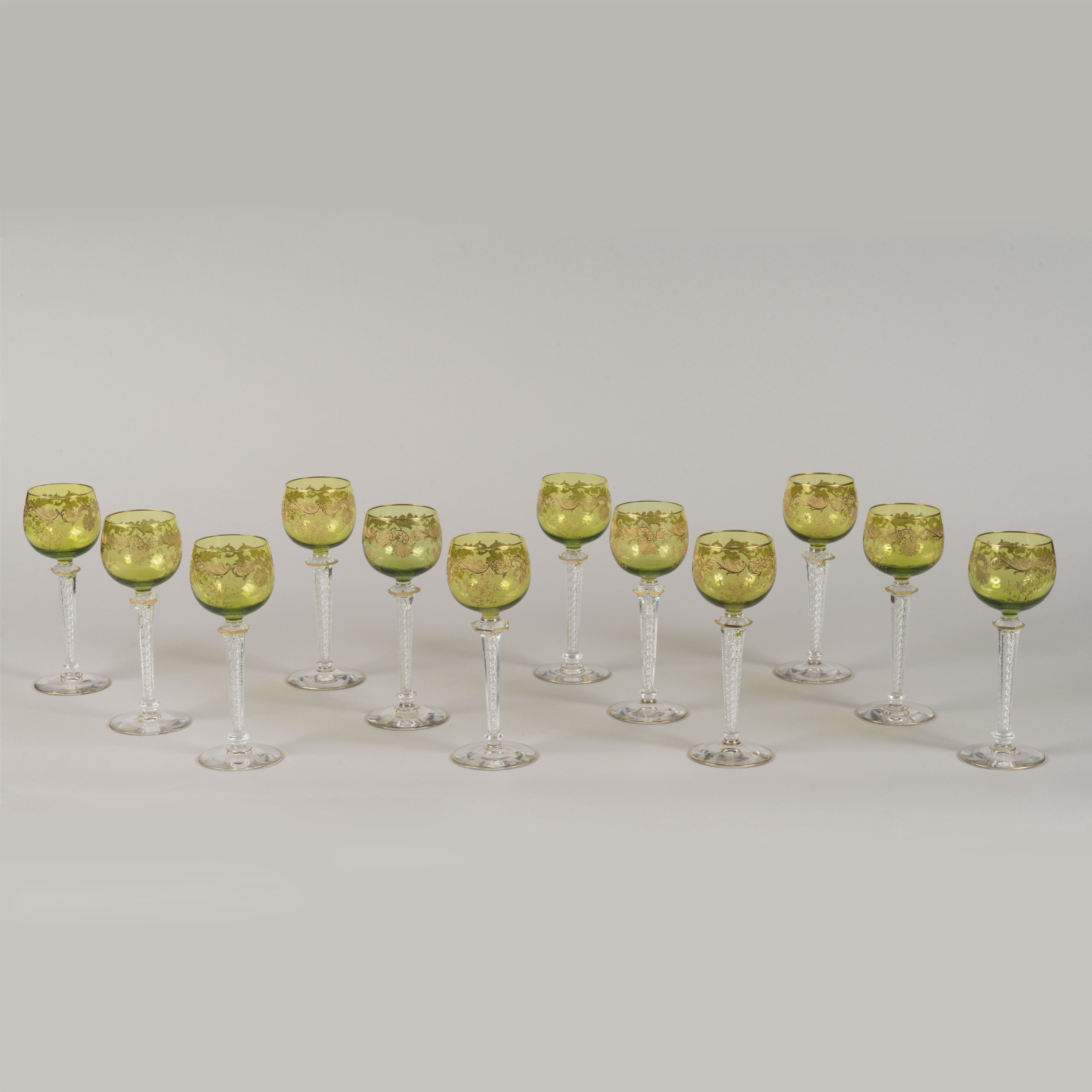 A Set of Twelve Green & Gilt Overlay Crystal Glasses Attributed to Cristallerie Saint-Louis