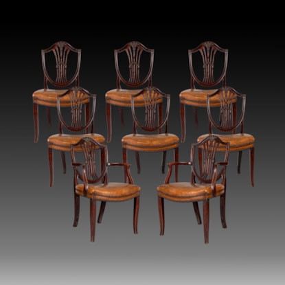A Set of Eight Hepplewhite Style Shield Back Dining Chairs