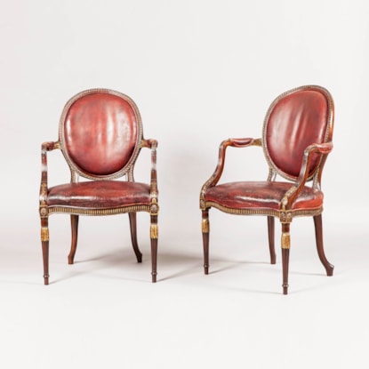 A Fine Pair of Armchairs in the Neo-classical manner of Robert Adam