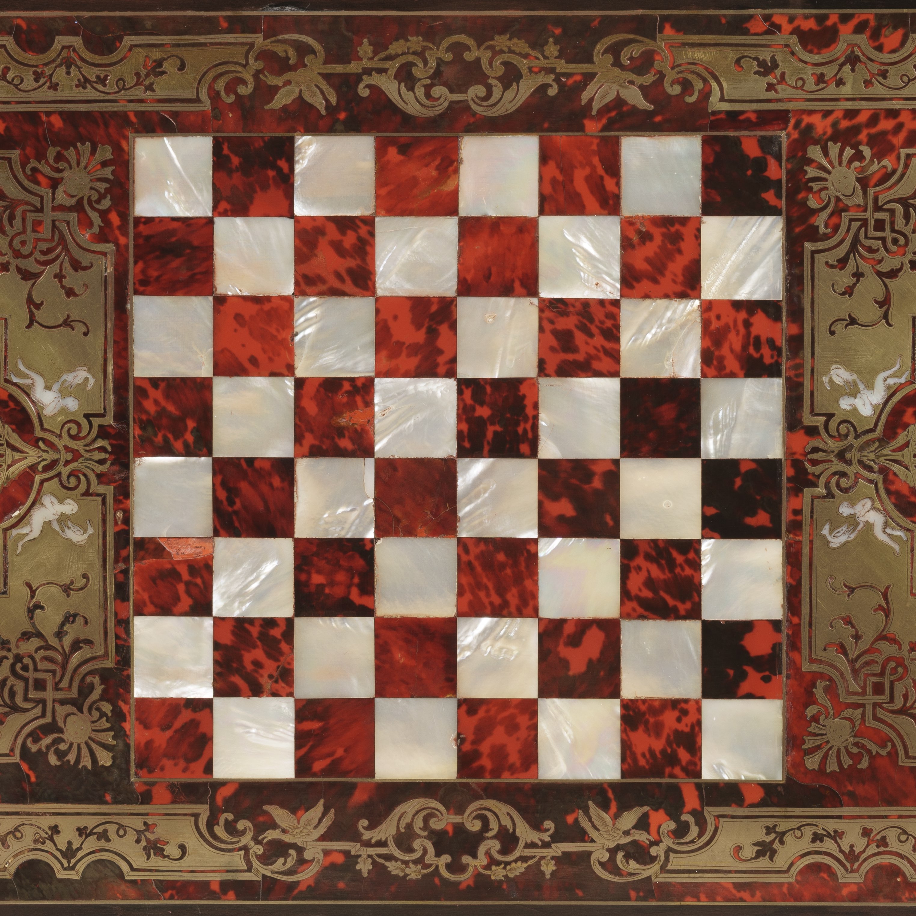 A Fine Pair of Games Tables attributed to Thomas Parker